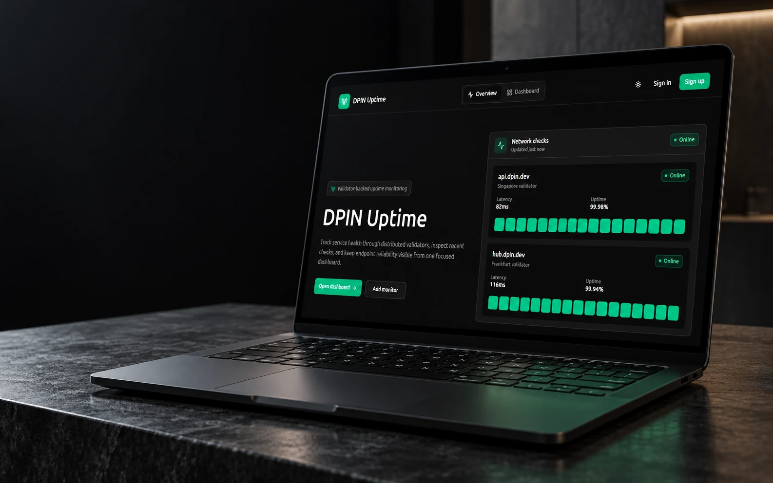Presentation mockup of DPIN Uptime on a laptop in a dark studio